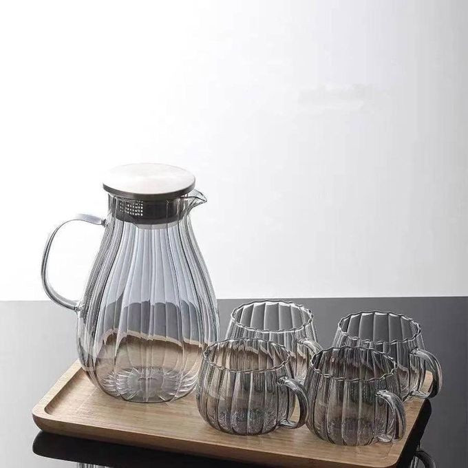 A Stylish Glass Tea Jug With Infuser And 4 Double-walled Glass Mugs, Perfect For Brewing, Serving, And Enjoying Tea.